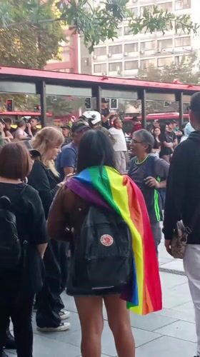 Police monitor crowd gathering in Santiago plaza amid protest concerns
