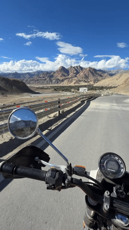 First-person motorcycle ride through Ladakh's mountain roads