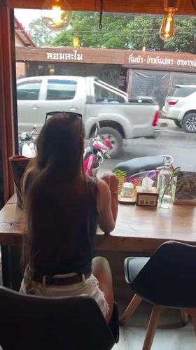 Woman shops health stores, visits cafe in rainy Baan Lamai morning