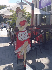 Street decor and a fountain statue in central Tallinn