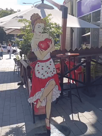 Street decor and a fountain statue in central Tallinn