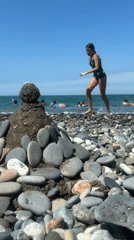 Lazy summer morning on Sochi's Black Sea pebble beach