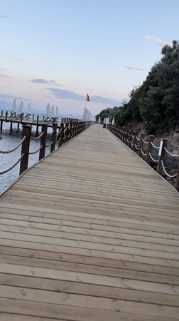 Boardwalk stroll and cat sighting captured in Menderes, Turkey