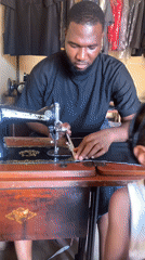 Daily life unfolds in Nigerian neighborhood, sewing and schoolchildren