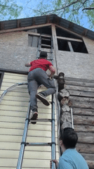 Construction work documented at wooden building in Noviy, Russia