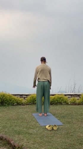 Woman practices yoga, enjoys noodle soup in Dhampus Phedi