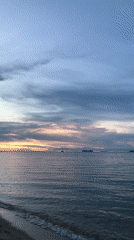 Sunset captured over calm waters near Baan Mae Nam, Thailand