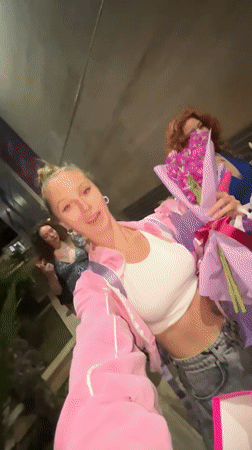 Woman with flowers and gift spotted in Budva