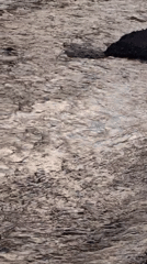 Monsoon motorcycle run through a Himalayan river valley