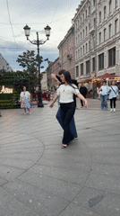 Breakdancers and partners share a Saint Petersburg plaza