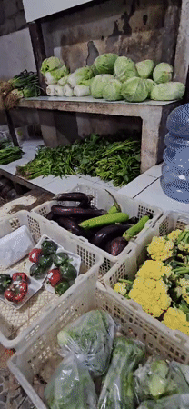 Fresh produce and Balinese buffet documented at Denpasar market