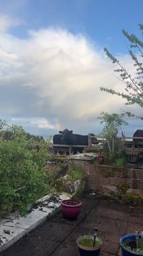 Rainbow spotted over waters in Scottish Highlands