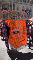 Traditional street parade with costumed children celebrated in La Paz