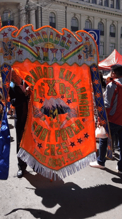 Traditional street parade with costumed children celebrated in La Paz