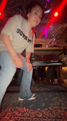 Female DJ performs at Moscow nightclubs wearing Supreme shirt