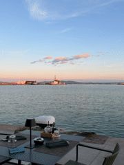 Waterfront dinner in Burgas harbor at dusk