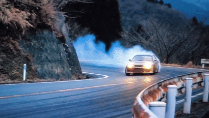 Sports cars drifting on track, marble statue in studio