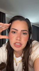 Woman Records Makeup Tutorial in Mexican Home Setting