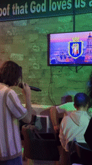 Karaoke night captured at Budva bar, selfies document evening