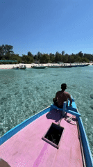 Early morning boat scene captured in Indonesian coastal waters
