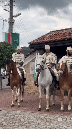 Traditional Bulgarian horseback ceremony held in Panagyurishte public square