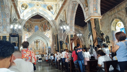 Religious service and choir performance at Venezuelan church