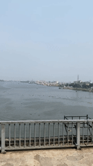 Bridge view captures Dhaka river port activity