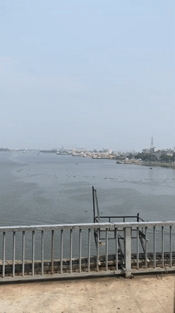 Bridge view captures Dhaka river port activity