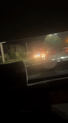 Nighttime traffic captured from car rear window in Plovdiv
