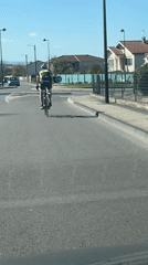 Cyclist approaches roundabout in Saint-Galmier, France