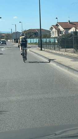 Cyclist approaches roundabout in Saint-Galmier, France