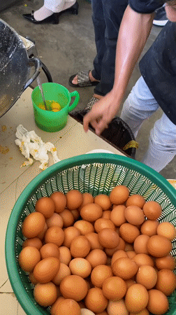 Banda Aceh street stall frying up a run of fresh omelets