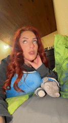 Woman with stuffed animals observed on bed in Sofia