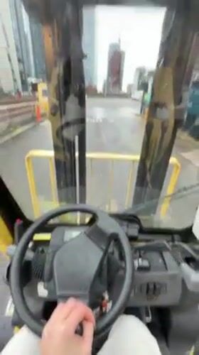Woman operates forklift in Manchester, documented with #FreakyFriday hashtag