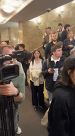 Crowd gathers in Kyiv public building lobby