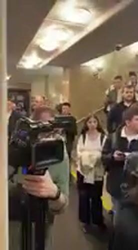 Crowd gathers in Kyiv public building lobby