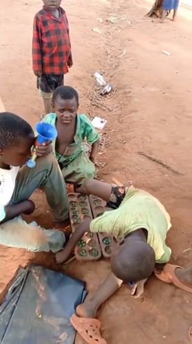 Village children play soccer, games in rural Democratic Republic Congo