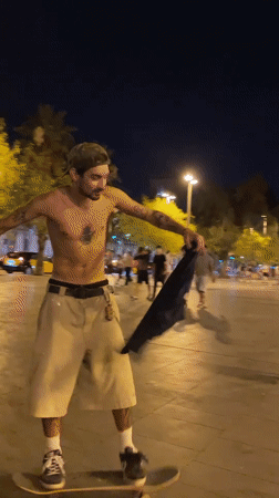 Nighttime skating and street hangout, same evening