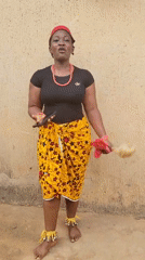 Woman in traditional Igbo dress documented across Onitsha area