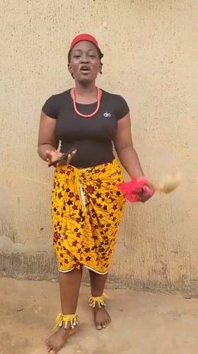 Woman in traditional Igbo dress documented across Onitsha area