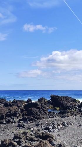 Volcanic beach and tide pools captured in Calhetas, Portugal