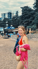 Woman in red bikini observed on Montenegro beach