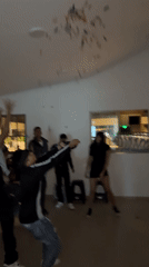 Young people celebrate with confetti, balloons in Arica house party