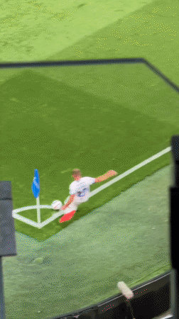 High-angle view of a soccer match near the penalty box