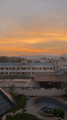 Sunset captured over Ratsada cityscape in Thailand