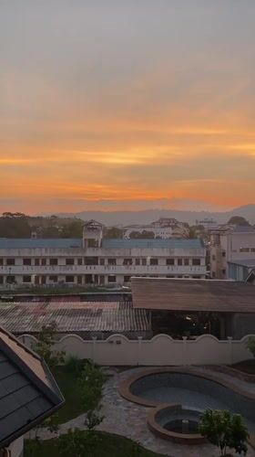 Sunset captured over Ratsada cityscape in Thailand