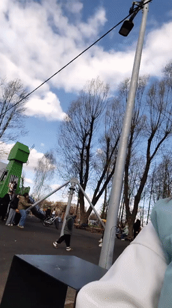 Afternoon park life documented in Yaroslavl during sunny May day