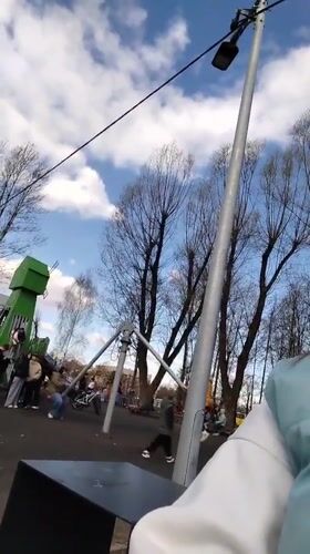 Afternoon park life documented in Yaroslavl during sunny May day