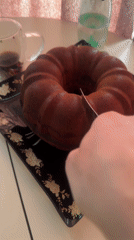 Morning leisure moment captured in Tbilisi home with cake