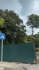 Street life and construction activity across a coastal urban area